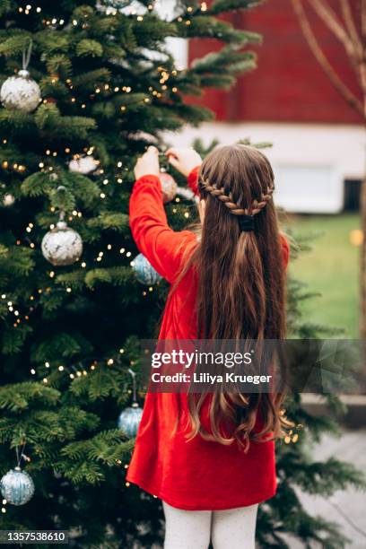 happy child decorates christmas tree. - happy santa claus over white blank stockfoto's en -beelden
