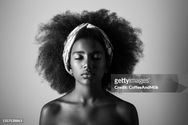 young beautiful afro woman - skin care black and white portrait stock pictures, royalty-free photos & images