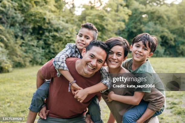 portrait of mexican family - connected family stock pictures, royalty-free photos & images