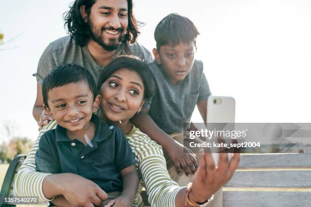 say hi to your grandma - indian ethnicity stock pictures, royalty-free photos & images