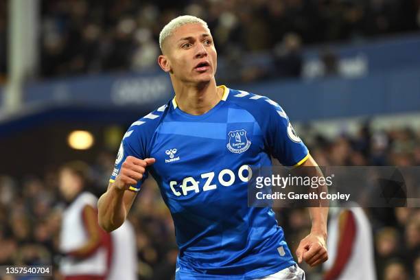 Richarlison of Everton celebrates after scoring a goal, that is later disallowed for offside by VAR during the Premier League match between Everton...