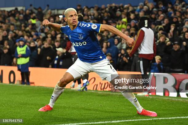 Richarlison of Everton celebrates after scoring a goal, that is later disallowed for offside by VAR during the Premier League match between Everton...