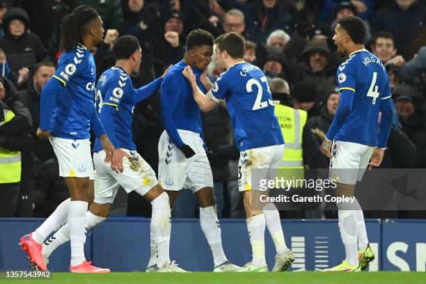 Demarai Gray of Everton celebrates with teammate Seamus Coleman after scoring their side's second goal during the Premier League match between...