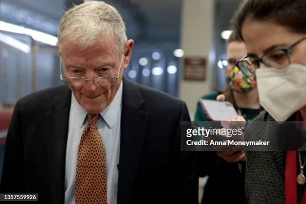 Sen. Jim Inhofe speaks with reporters in the Senate Subway of the Capitol during a vote on December 06, 2021 in Washington, DC. After passing...