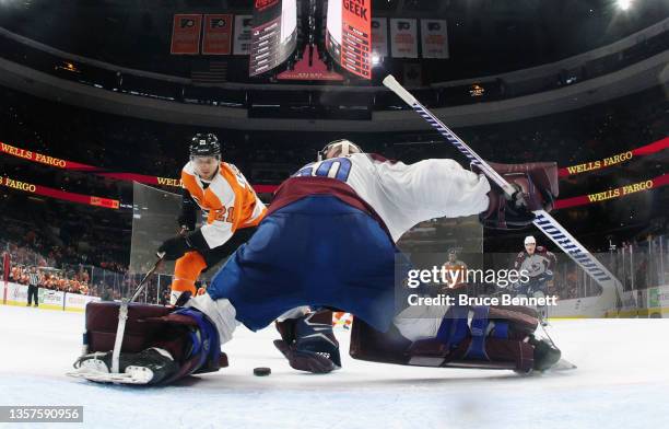 Scott Laughton of the Philadelphia Flyers scores a shorthanded goal at 18:35 of the third period against Justus Annunen of the Colorado Avalanche at...