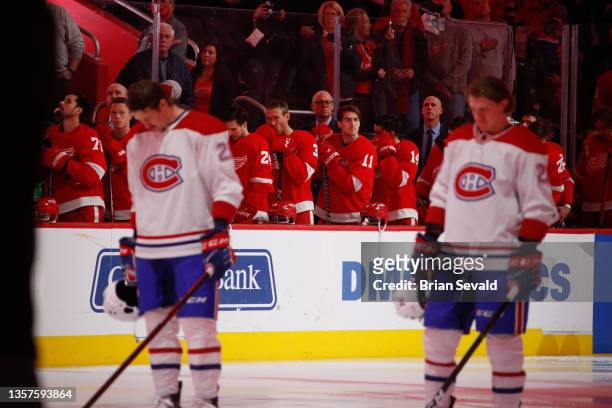 Players from the Detroit Red Wings stand for the National Anthem before the start of an NHL game against the Montreal Canadiens at Little Caesars...