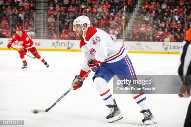 Joel Armia of the Montreal Canadiens controls the puck against the Detroit Red Wings during an NHL game at Little Caesars Arena on November 13, 2021...