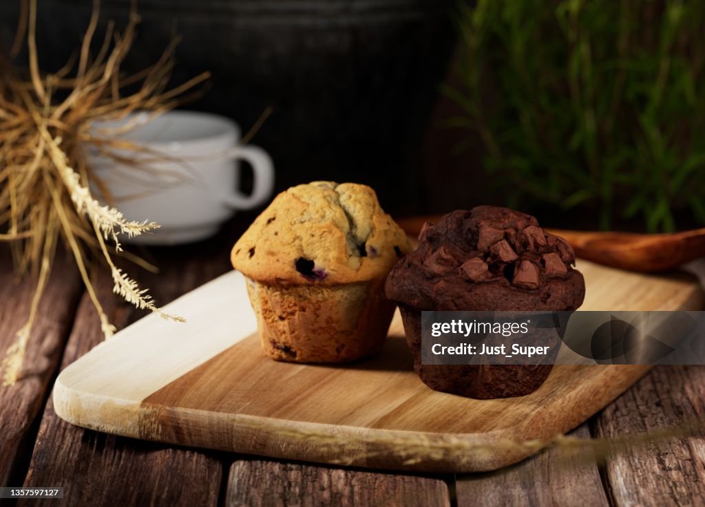 Muffins on wood cutting board