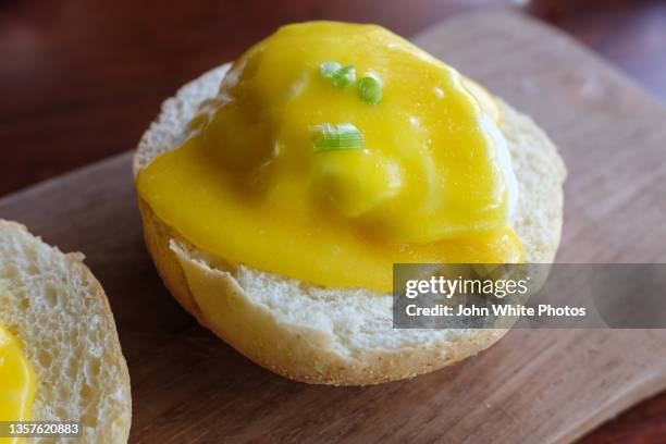 egg with hollandaise sauce. sanur bali indonesia - sanur bildbanksfoton och bilder