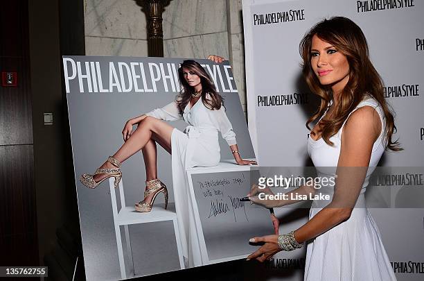 Melania Trump signs Philadelphia Style Magazine cover enlargement at The Philadelphia Style Magazine Cover Event at Ritz Carlton Hotel on December...