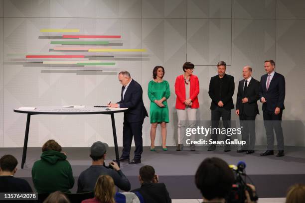 Olaf Scholz of the German Social Democrats , Annalena Baerbock and Robert Habeck , co-leaders of the German Greens Party, Christian Lindner , leader...