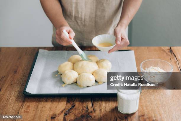 woman hands shaping sweet bread - called in german dreikönigskuchen - step by step, traditionally baked in switzerland on january 6th. - epiphany 2021 stock pictures, royalty-free photos & images