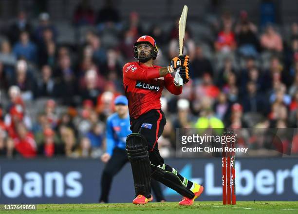 Mohammad Nabi of the Renegades bats during the Men's Big Bash League match between the Melbourne Renegades and the Adelaide Strikers at Marvel...