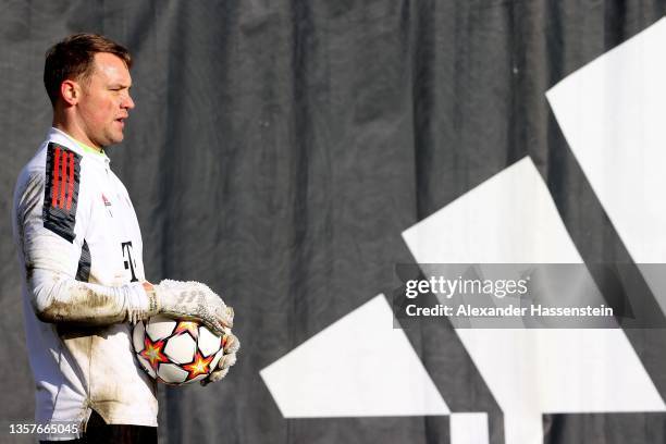 Manuel Neuer of FC Bayern München looks on during a FC Bayern training session at Säbener Strasse training ground on December 07, 2021 in Munich,...