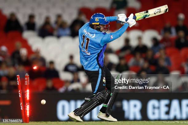 Daniel Worrall of the Adelaide Strikers is bowled by Kane Richardson of the Renegades during the Men's Big Bash League match between the Melbourne...