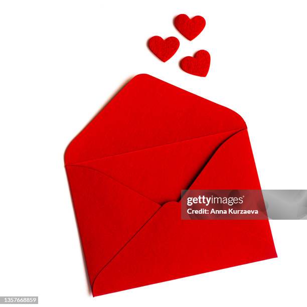 close up of red envelope on white background, top view. valentine's day card. - red card envelope stock pictures, royalty-free photos & images