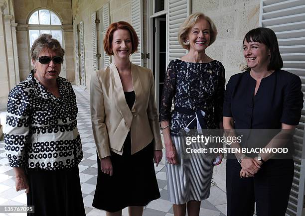 Australia's first female prime minister, Julia Gillard , is joined by Australia's first female High Court judge Mary Gaudron , Australia's first...