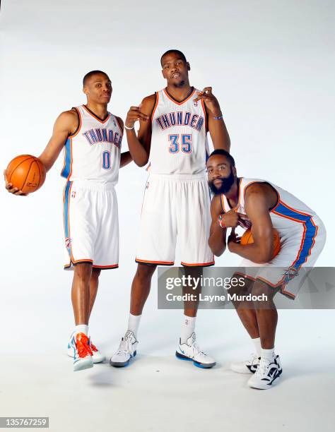 Russell Westbrook, Kevin Durant and James Harden pose for a portrait during 2011 NBA Media Day on December 13, 2011 at the Oklahoma City Arena in...