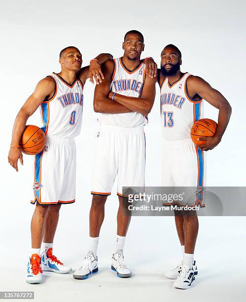 Russell Westbrook, Kevin Durant and James Harden pose for a portrait during 2011 NBA Media Day on December 13, 2011 at the Oklahoma City Arena in...
