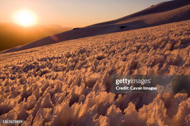 a snow field of penitentes-a conditon caused by differential melting- on volcan san jose in the andes mountains of chile - penitentes stockfoto's en -beelden