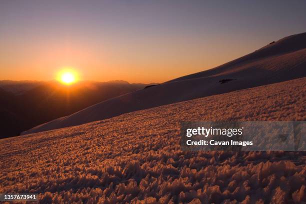 a snow field of penitentes-a conditon caused by differential melting- on volcan san jose in the andes mountains of chile - penitentes stockfoto's en -beelden