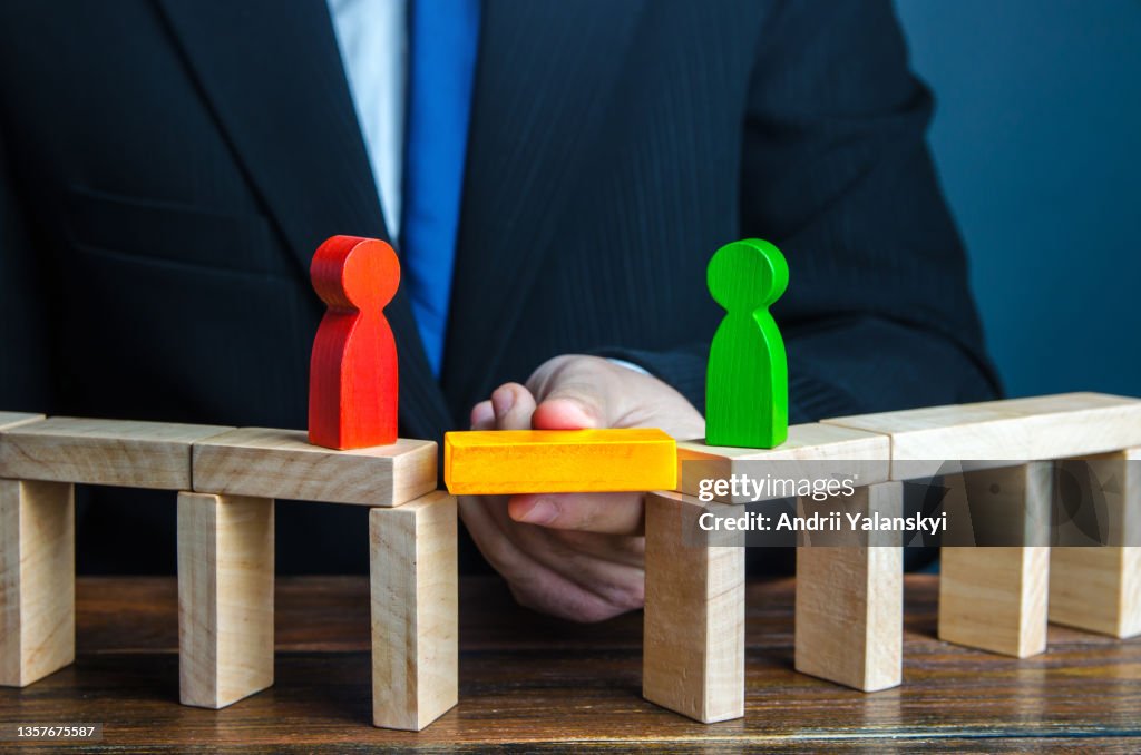 Mediator to remove the gap of understanding between people. Compromise dispute resolution. Build bridges improve relationships. Mediation of conflicting parties. Stop conflict escalation. Win-win