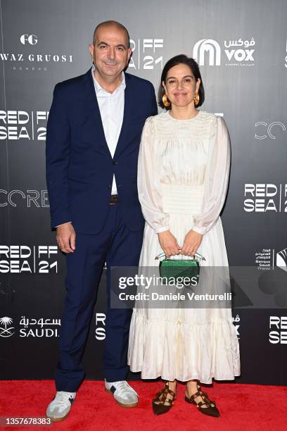 Hany Abu-Assad and Amira Diab attend the Cyrano premiere during the Red Sea International Film Festival on December 06, 2021 in Jeddah, Saudi Arabia.