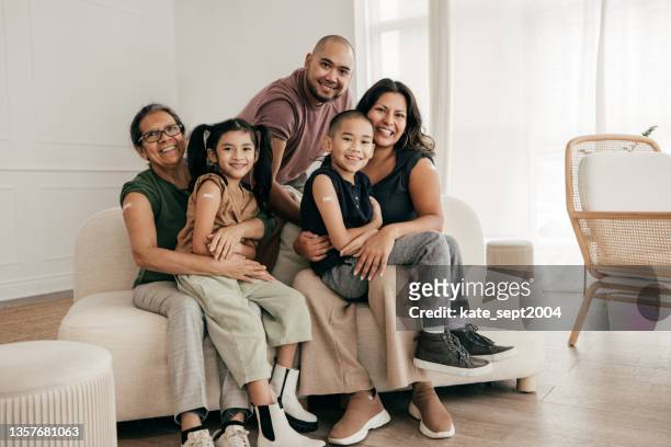 vaccination for the family and kids - filipino family stock pictures, royalty-free photos & images