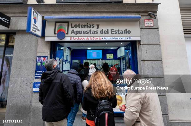 Several people queue at the Lottery Administration 'El jorobado de la suerte' with less than three weeks left for the Extraordinary Draw of the...