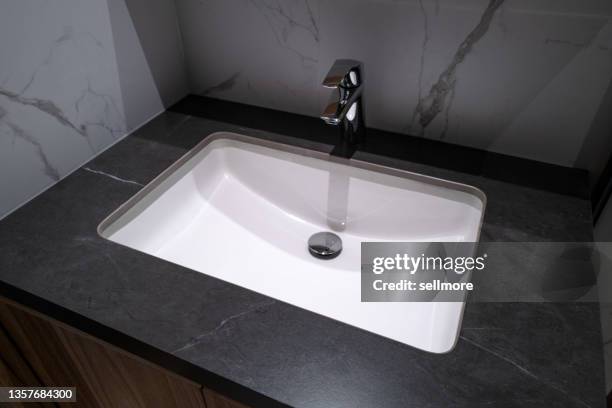 bathroom sink - bathroom closeup stockfoto's en -beelden