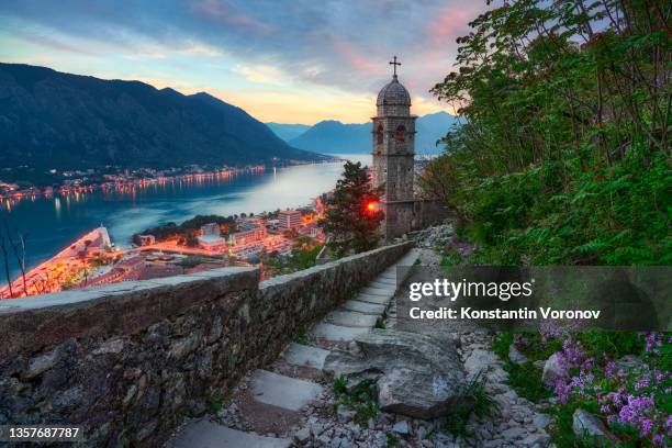 view on the bay of kotor. in the foreground church of our lady of remedy, montenegro - kotor bay ストックフォトと画像