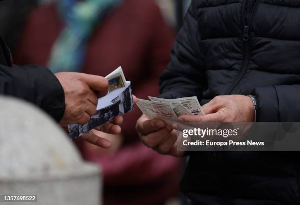 Person with several Christmas lottery tickets with less than three weeks to go until the Extraordinary Christmas Lottery Draw on December 7 in...