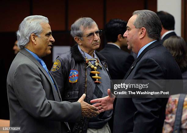 Virginia Lt. Gov. Bill Bolling arrives in Manassas, VA to attend a Small Business Roundtable on December 7, 2011. Here he meets Al Nasiri with State...