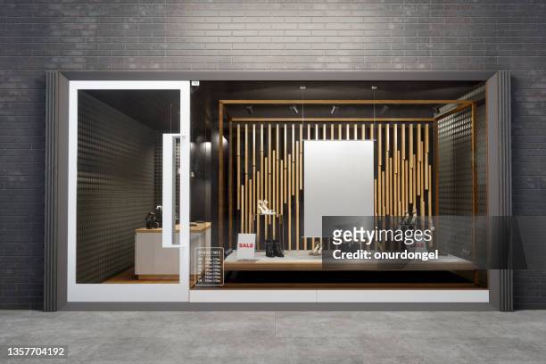 storefront of shoe store with poster mockup and shoes - window shoppen stockfoto's en -beelden