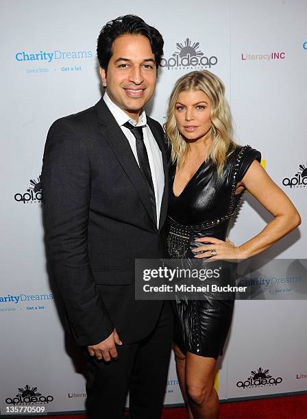 Omar Amanat, CEO of Charity Dreams and singer Fergie attend APL.De.Ap's Birthday Celebration and Launch of Charity Dreams at The Conga Room at L.A....