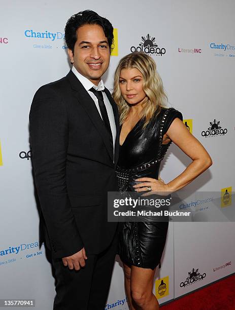 Omar Amanat, CEO of Charity Dreams and singer Fergie attend APL.De.Ap's Birthday Celebration and Launch of Charity Dreams at The Conga Room at L.A....