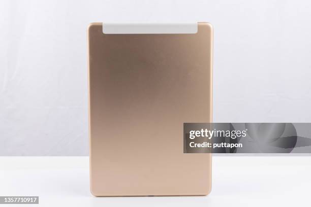 Gold Tablet Photos and Premium High Res Pictures - Getty Images