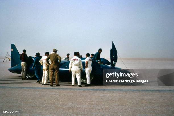Bluebird CN7, Donald Campbell and support crew, World Land Speed Record attempt, Lake Eyre, Australia, 1964. Artist Unknown.