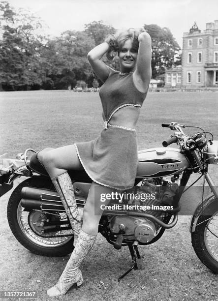 Monty Python actress Carol Cleveland on Triumph Bandit motorcycle, 1971. Artist Unknown.