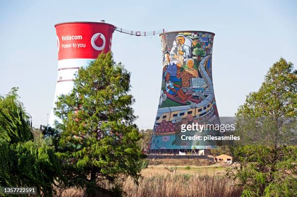 tribute to ending of apartheid on cooling towers, johannesburg, cape peninsula, south africa. - soweto towers stock pictures, royalty-free photos & images