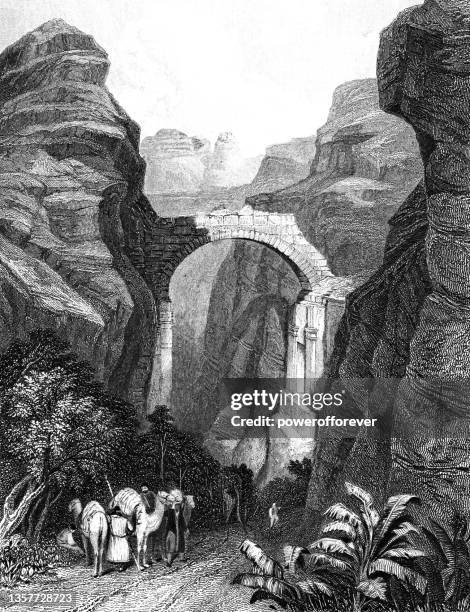 triumphbogen über dem siq bei petra in jordanien - osmanisches reich 19. jahrhundert - treasury stock-grafiken, -clipart, -cartoons und -symbole