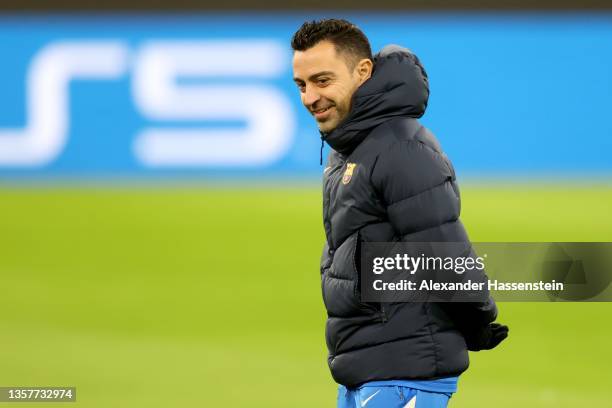 Xavier Hernández i Creus, head coach of FC Barcelona looks on during a FC Barcelona training session at Allianz Arena on December 07, 2021 in Munich,...