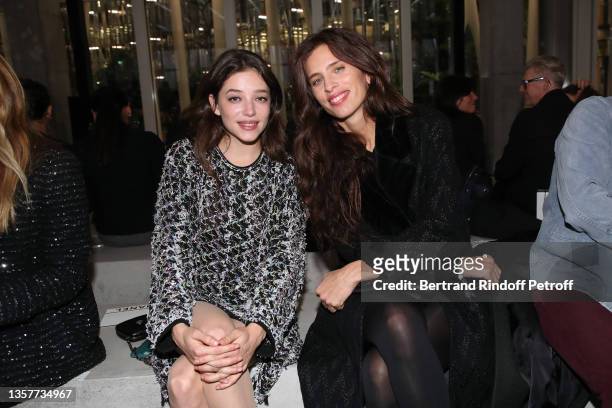 Zoé Adjani and Maïwenn Le Besco attend the Chanel Metiers D'Art 2021-2022 show at Le 19M on December 07, 2021 in Paris, France.
