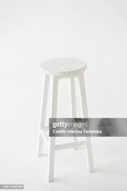 high white chair on a white background. - sgabello foto e immagini stock