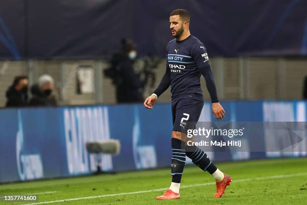 Kyle Walker of Manchester City looks dejected as he leaves the pitch after being shown a red card by Match Referee, Sandro Schaerer during the UEFA...