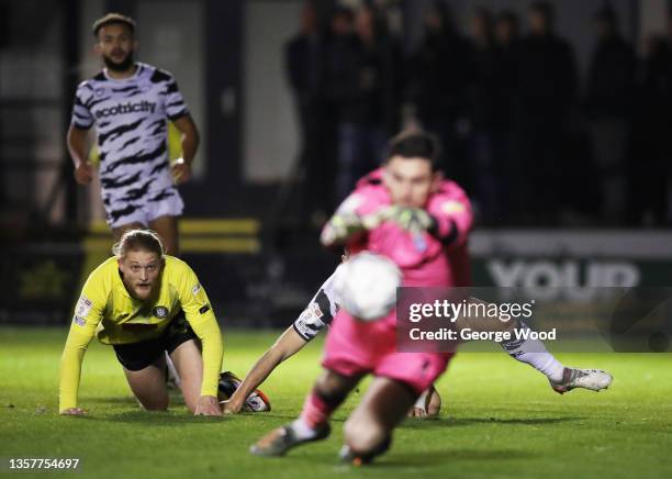 Luke Armstrong of Harrogate Town looks on as Luke McGee of Forest Green Rovers makes a save during the Sky Bet League Two match between Harrogate...