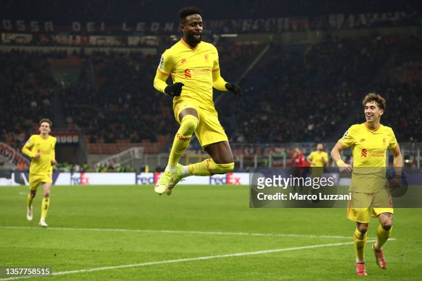 Divock Origi of Liverpool celebrates after scoring their side's second goal during the UEFA Champions League group B match between AC Milan and...