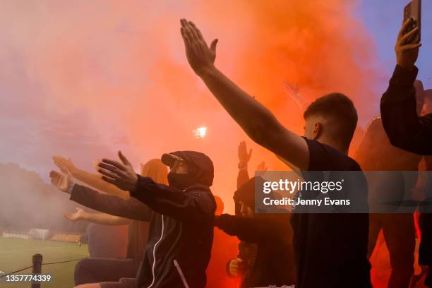 Wanderers fans set off flares during the FFA Cup round of 16 match between Leichhardt FC and Western Sydney Wanderers at Leichhardt Oval on December...