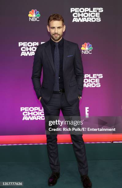 Pictured: Nick Viall arrives to the 2021 People's Choice Awards held at Barker Hangar on December 7, 2021 in Santa Monica, California.