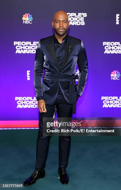 Pictured: Karamo Brown arrives to the 2021 People's Choice Awards held at Barker Hangar on December 7, 2021 in Santa Monica, California.